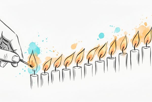 Hand-drawn ink illustration: a hand lights a match to the first of an ascending row of candles, each flame lighting the next, with soft cyan and apricot watercolour splashes — small successes building self-efficacy