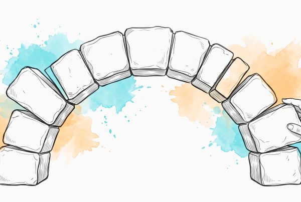 Ink illustration of a stone arch with a few stones slipped out of line, a hand pressing one back into place, with cyan and apricot watercolour splashes